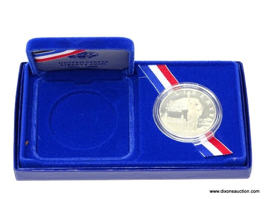 1986 LIBERTY SILVER DOLLAR PROOF COIN W/ COA AND IN PRESENTATION BOX