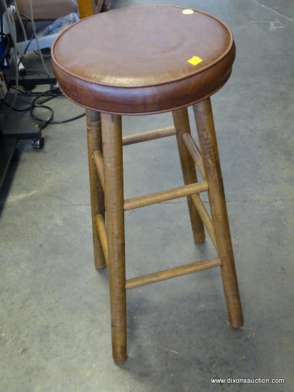 (R2) STOOL; WOODEN AND LEATHER SEAT STOOL. WOULD BE GREAT TO USE AT AN AT HOME BAR! MEASURES 13 IN X