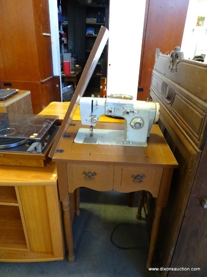 (R3) SEWING MACHINE; PENNCREST SEWING MACHINE IN A WOOD FINISH SEWING CABINET. WITH LIFT TOP DOWN