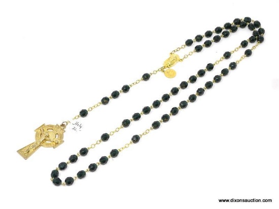 VINTAGE ITALIAN ROSARY; DARK GREEN JEWEL CUT PLASTIC BEADS ON A GOLD COLORED STRAND, WITH MEDAL AND