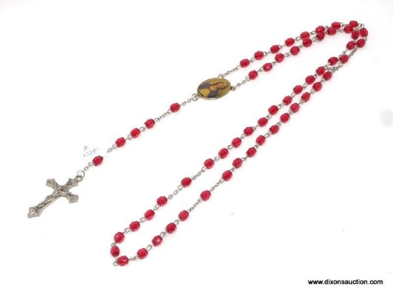 VINTAGE ROSARY WITH RED PLASTIC BEADS; ON A SILVER COLORED STRAND MEASURING 29 IN LONG, WITH A