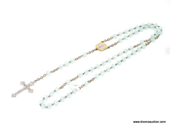 VINTAGE AQUAMARINE BLUE PLASTIC ROSARY; 5 SETS OF 10 BEADS ARE ARRANGED ON A 26 INCH LONG STRAND,