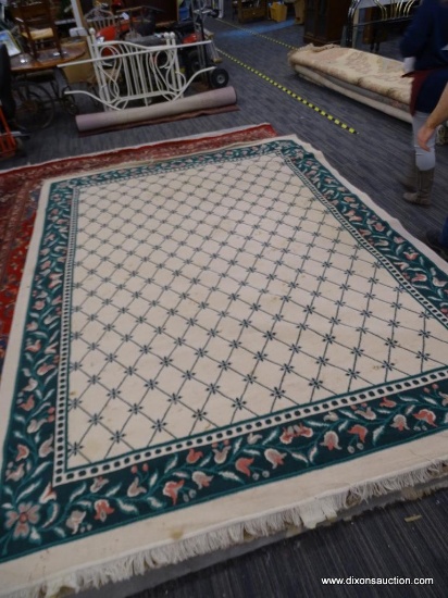 MACHINE WOVEN AREA RUG. MADE IN THE USA. MEASURES 10 FT 8 IN X 9 FT 8 IN