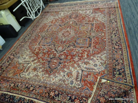HAND KNOTTED HERIZ AREA RUG. HAS SOME DAMAGE IN ONE OF THE CORNERS (IS EASY TO HIDE). HAS A CLASSIC