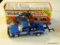 MOBIL TOY TRUCK; MOBIL COLLECTIBLE TOY TOW TRUCK 3RD IN A SERIES (1995). HAS WORKING HEAD AND TAIL