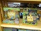 (CNTR) SHELF LOT OF SPONGEBOB ITEMS; SPONGEBOB SWAP & BOP SINGING SPONGEBOB, AND A PLUG IN TV GAMES