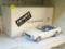 FORD MUSTANG; THE DANBURY MINT 1966 FORD MUSTANG 1:24 SCALE MODEL CAR WITH THE ORIGINAL BOX AND