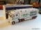 HESS TOY TRUCK AND RACE CARS; 1 OF A PAIR OF TOY TRUCKS WITH INDY STYLE RACE CARS. IN THE ORIGINAL