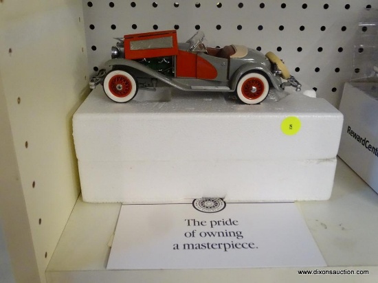 DUESENBERG SSJ; THE DANBURY MINT DUESENBERG SSJ 1:24 SCALE MODEL CAR WITH ORIGINAL STYROFOAM CASE