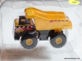 MAISTO AND TONKA DUMP TRUCK; 1 OF A PAIR OF TONKA DUMP TRUCKS BY MAISTO. IS A 1:43 SCALE MODEL. HAS