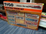 TYCO ELECTRIC TRAIN SET; NEAR COMPLETE HO SCALE TRAIN SET WITH ALL COMPONENTS EXCEPT THE POWER PACK.