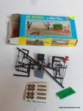 AHM TRAIN MODEL ACCESSORIES; INCLUDES RAIL CROSSING SIGNS, OIL DRUMS, AND MORE!
