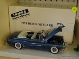 BUICK SKYLARK; THE DANBURY MINT 1953 BUICK SKYLARK 1:24 SCALE MODEL CAR WITH THE ORIGINAL BOX.