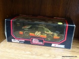 RACING CHAMPIONS STOCK CAR; 1:24 SCALE DIECAST STOCK CAR #66. BRAND NEW IN THE BOX!