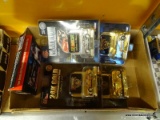 TRAY LOT OF GOLD PLATED AND PLATINUM PLATED 1:43 SCALE CARS; 1 IS #30 IN PLATINUM, 1 IS #94 IN GOLD,