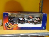 WINNERS CIRCLE DALE EARNHARDT JR. STOCK CAR; 1:24 SCALE DIECAST DALE EARNHARDT JR. #1 STOCK CAR.