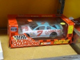 RACING CHAMPIONS STOCK CAR; 1:24 SCALE DIECAST STOCK CAR #7. BRAND NEW IN THE BOX!