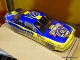 COLLECTIBLE CAR TIN; 100TH YEAR ANNIVERSARY OF GOODYEAR AND 50TH ANNIVERSARY OF NASCAR COMMEMORATIVE