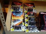 (CNTR) RACING CHAMPIONS 1:64 SCALE CAR LOT; ALL ARE BRAND NEW IN THE BLISTER PACKAGES! INCLUDES