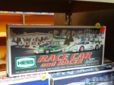 (CNTR) HESS RACE CAR; INCLUDES A RACE CAR AND RACER. IS IN THE ORIGINAL BOX!