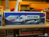 (CNTR) HESS TOY TRUCK AND RACERS; IN THE ORIGINAL BOX AND APPEARS TO BE NEVER USED!