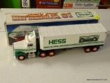 HESS 18 WHEELER; COMES WITH A RACER AND IS IN THE ORIGINAL BOX. APPEARS TO BE NEVER USED!