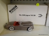 JAGUAR XK120; THE DANBURY MINT 1949 JAGUAR XK120 1:24 SCALE MODEL CAR WITH THE ORIGINAL BOX.