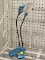 MIGHTY BRIGHT DESK LAMP; BLUE AND BLACK DESK LAMP MADE BY MIGHTY BRIGHT. THIS LAMP HAS TWO FLEXIBLE