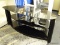 BLACK TEMPERED GLASS ENTERTAINMENT STAND/TABLE; BLACK TEMPERED GLASS ENTERTAINMENT STAND WITH ANGLED