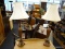PAIR OF TABLE LAMPS WITH FLUTED COPPER BASES; EACH MEASURES 27.5 IN TALL AND COMES WITH A CREAM