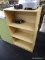 BLONDE WOOD GRAIN SHELF; THIS IS A BLONDE COLORED WOOD GRAIN SHELVING UNIT WITH 3 ADJUSTABLE
