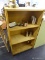 LIGHT WOOD GRAIN SHELF; THIS IS A LIGHT COLORED WOOD GRAIN SHELVING UNIT WITH 3 ADJUSTABLE SHELVES.