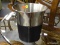 ICE BUCKET; STAINLESS STEEL AND LEATHER 2 HANDLED ICE BUCKET. MEASURES 10 IN X 8 IN
