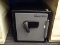 SENTRY SAFE FIREPROOF SAFE; HAS AN ELECTRIC BATTERY POWERED LOCK (NEEDS BATTERY AND POSSIBLY