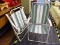 LAWN CHAIRS; PAIR OF ALUMINUM AND VINYL FOLDING LAWN CHAIRS. UNFOLDED MEASURES 23 IN X 24 IN X 36 IN