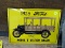 METAL 1925 FORD WAGON SIGN; YELLOW METAL WALL SIGN THAT SAYS 