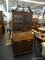 CARVED MAHOGANY CHIPPENDALE SECRETARY BUREAU; BROKEN PEDIMENT TOP WITH ROLLED MOLDED ARCHES AND