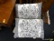 PAIR OF WHITE AND BLACK FLORAL AND STRIPED PILLOWS; ACCENT PILLOWS WITH CLASS AND STYLE. FLORAL