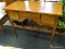 MAPLE 3 DRAWER WRITING DESK; CENTER DRAWER FLANKED BY A DEEPER DRAWER ON EACH SIDE, ALL ARE