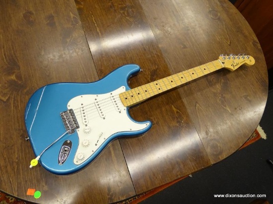 FENDER STRATOCASTER GUITAR; ELECTRIC BLUE, INCLUDES SOFT-SIDED GIG BAG. THE FENDER STANDARD STRAT IS