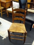 LADDERBACK SIDE CHAIR WITH RUSH SEAT; POINTED FINIALS ON EACH SIDE OF THE CREST, 3 SCALLOPED LADDER