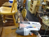 2 PC LOT; INCLUDES A HANDY CAR VACUUM CLEANER WITH AUTOMOBILE CIGARETTE LIGHTER PLUG AND A PIN-IT