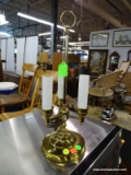 DESK LAMP; 3 LIGHT BRASS DESK LAMP. HAS RING STYLE FINIAL. JUST NEEDS A SHADE! MEASURES 17 IN TALL