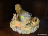 LION THEMED VOTIVE HOLDER; THIS VOTIVE HOLDER IS IN THE FORM OF A PRIDE OF LIONS LAYING DOWN TO REST