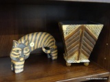 BLACK/TAN SAFARI DECOR LOT; INCLUDES 2 TOTAL PIECES. A CARVED ARCHING TIGER FIGURINE AND A SMALL