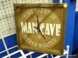 WOODEN MAN CAVE CLOCK; WOODEN WALL CLOCK THAT SAYS 