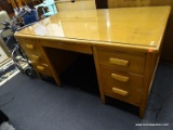 VINTAGE SOLID WOOD TEACHER'S DESK; LIGHT COLORED WOOD WITH KNEE HOLE DESIGN, CENTER DRAWER WITH