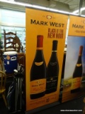 MARK WEST WINE PROMOTIONAL STANDEE; INCLUDES POST/FRAME, ROLLING PROMO IMAGE, AND STURDY BASE, AS