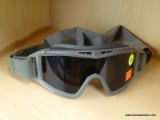 REVISION MILITARY GOGGLES; CAMO GREEN MILITARY GOGGLES MADE BY REVISION. LENSES ADJUST AUTOMATICALLY