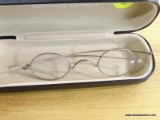 VINTAGE EYEGLASSES; METAL RIM VINTAGE EYEGLASSES WITH ROUND LENSES. THEY ARE IN A BLACK NATURALLY